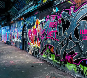 gaya dan aliran populer dalam seni grafiti jalanan
